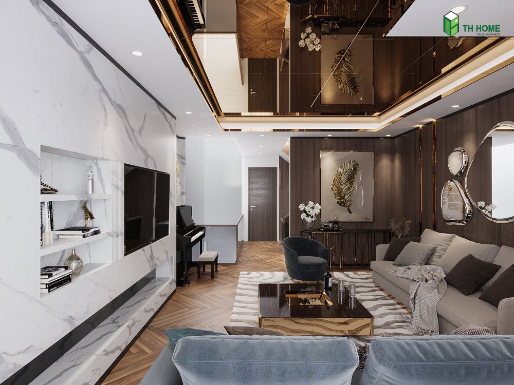 Không gian phòng khách được thiết kế với những chi tiết giúp không gian thêm rộng rãi, thông thoáng